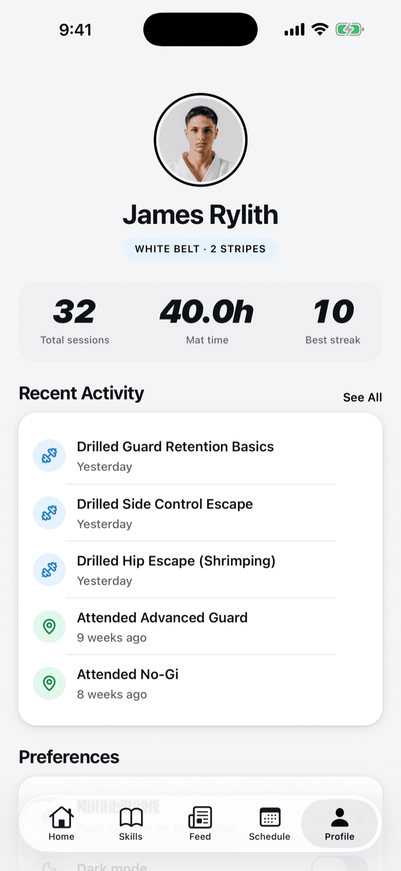 A member profile in the Forma app: white belt with two stripes, 32 total sessions, 40 hours of mat time, a best streak of 10 weeks, and a list of recently drilled techniques.